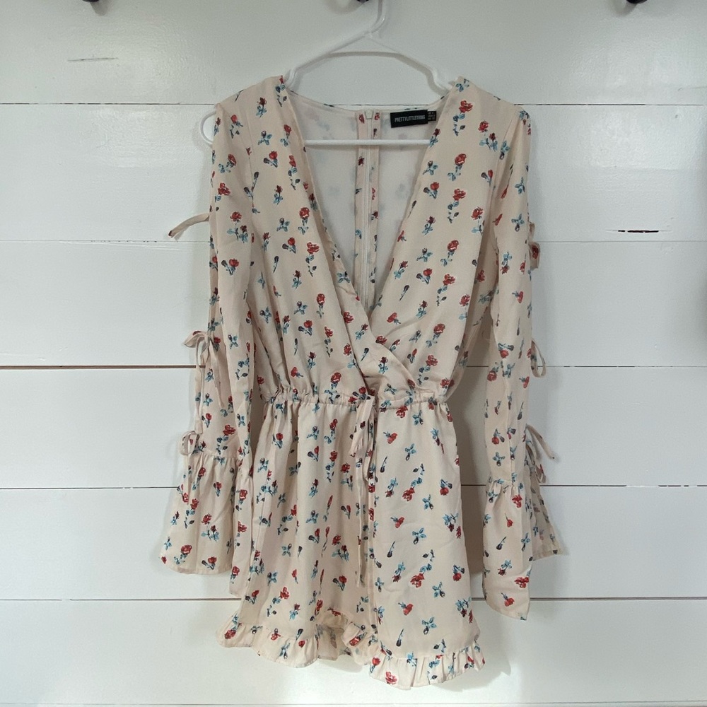 Ruffle long sleeve romper